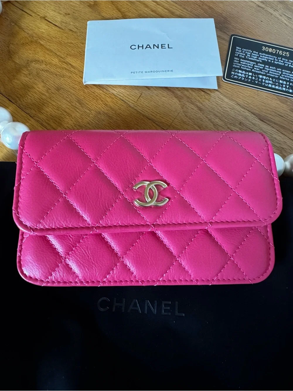 CHANEL Hot Pink Quilted Mini Wallet with Pearl Chain